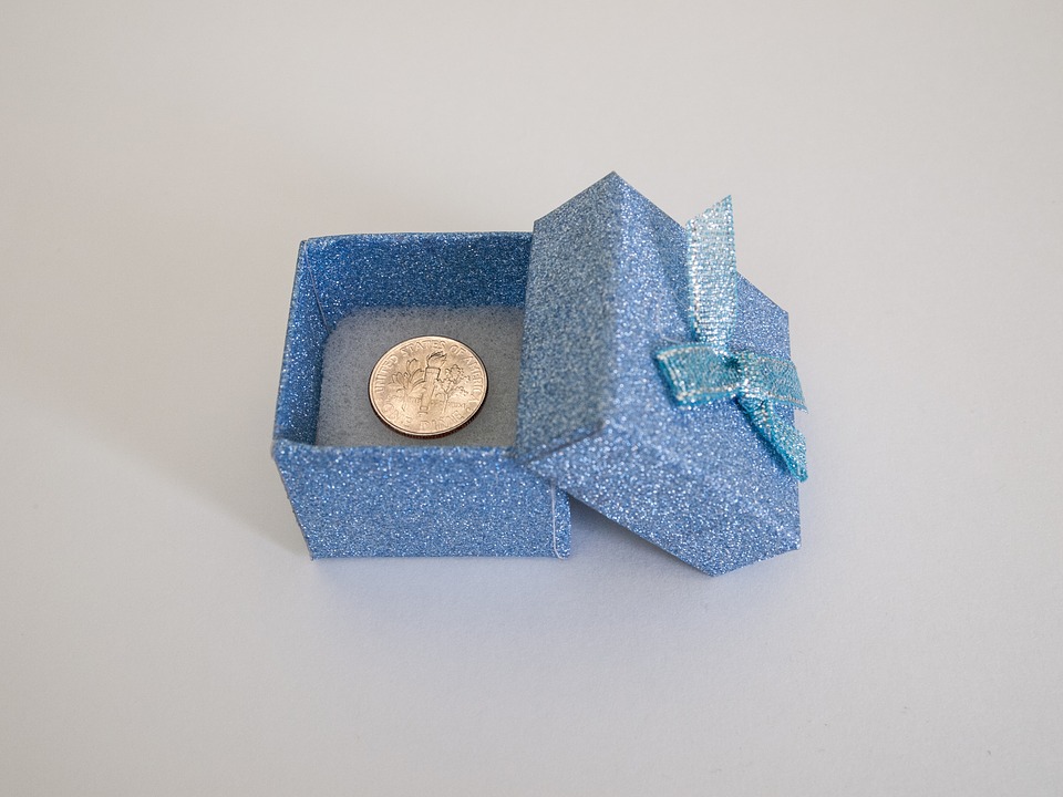 Gift box with single coin inside