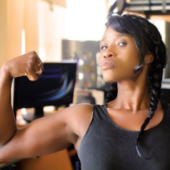 Strong dark-skinned woman